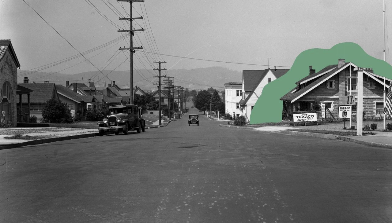 A historic photograph of East Burnside Street with the clinic building marked